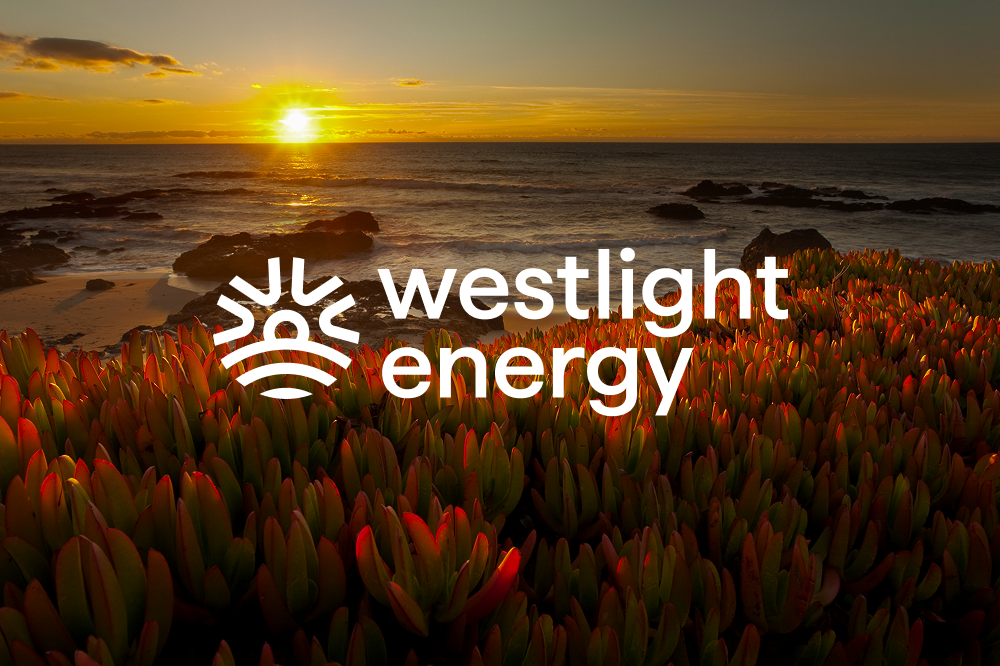 WestLight Energy 的標誌出現在前景中，背景則是夕陽下的海岸線地平線景觀。
